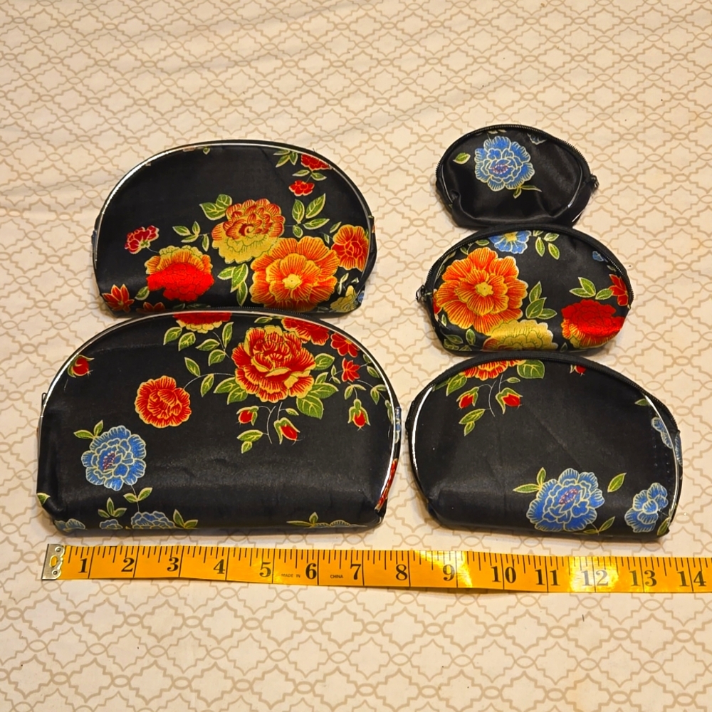 NWOT Cosmetic/Jewelery bags Set of 5